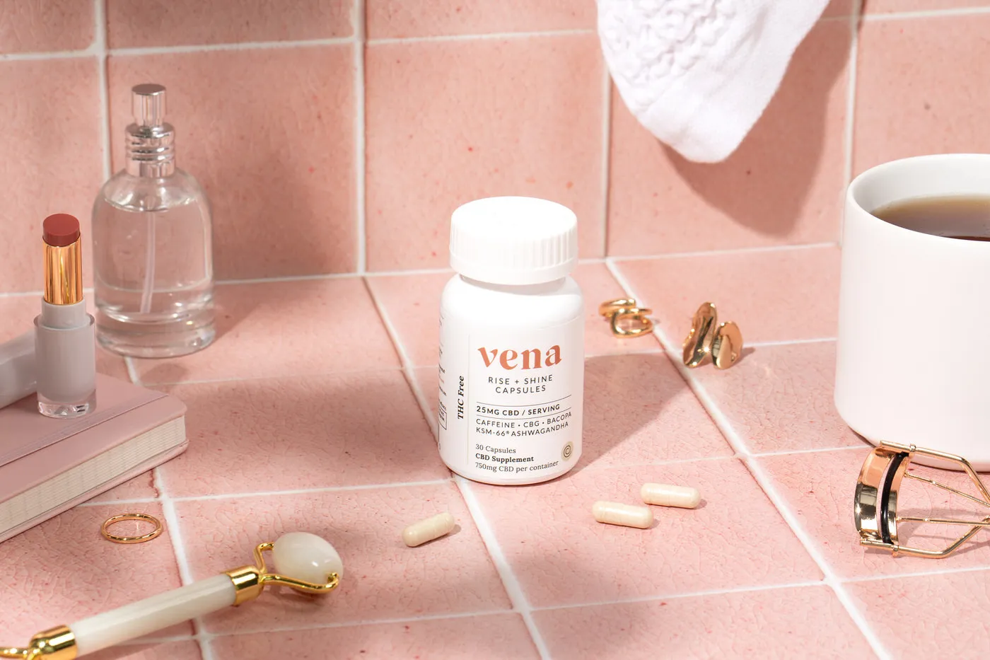 cbd pills on pink counter 